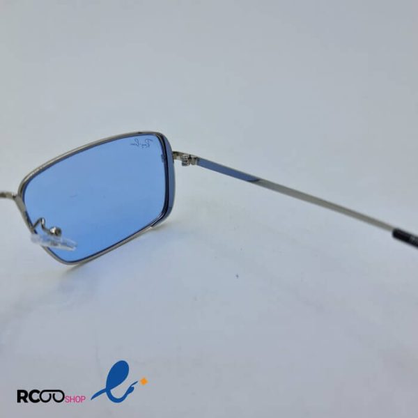 عکس از عینک شب با فریم فلزی و مستطیلی شکل و لنز آبی رنگ برند ریبن مدل b80-628