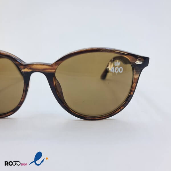 عکس از عینک آفتابی با فریم گرد و رنگ قهوه ای سوخته مدل 326-053