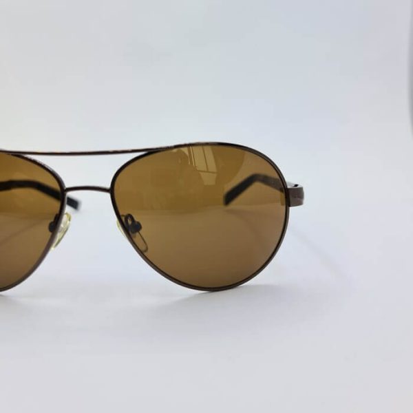 عکس از عینک آفتابی برند پرسول با فریم فلزی و دسته فنری و عدسی شیشه ای مدل po3090s