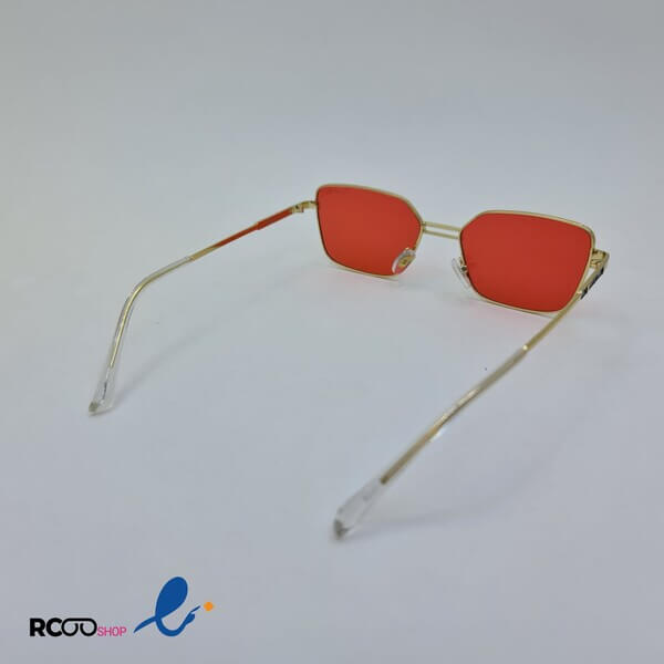 عکس از عینک شب مستطیلی شکل با لنز قرمز فریم فلزی و طلایی رنگ برند chanel مدل 22013