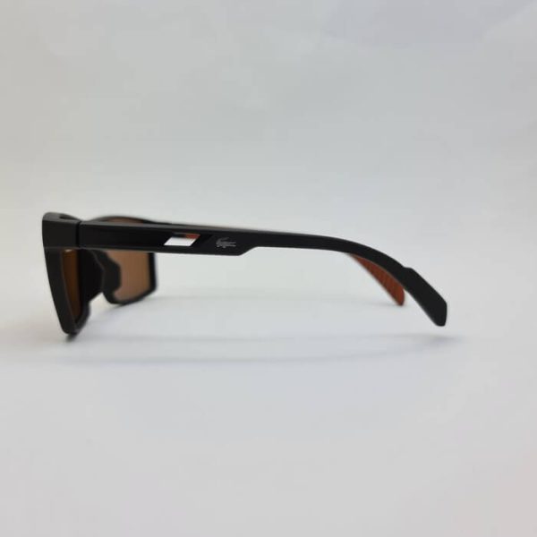 عکس از عینک آفتابی برند لاگوست با فریم و عدسی قهوه ای با فریم کائوچو مدل 2162