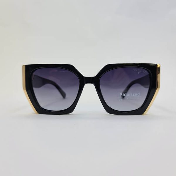 عکس از عینک آفتابی پولاریزه با فریم مشکی و طلایی رنگ برند ولنتینو مدل vn58002
