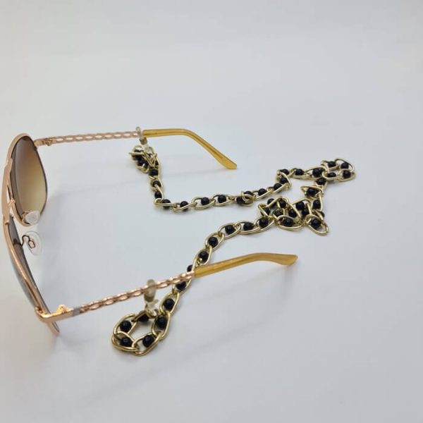 عکس از بند عینک طلایی رنگ با مروارید مشکی رنگ مدل 991578