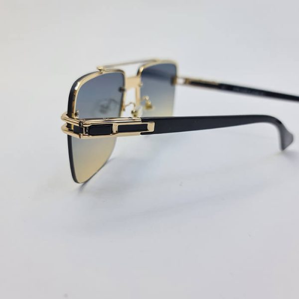 عکس از عینک آفتابی dita grand-evo two نیم فریم، فریم طلایی و مربعی شکل مدل 09k