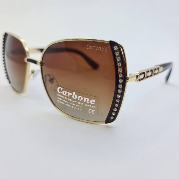 عکس از عینک آفتابی پلاریزه با فریم طلایی و نگین دار و دسته طرح دار برند کربن carbone مدل 58126