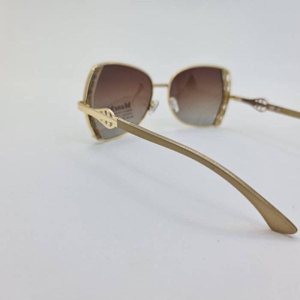 عکس از عینک آفتابی با فریم و دسته طرح دار و از جنس فلزی زنانه برند manchini مدل p2056b
