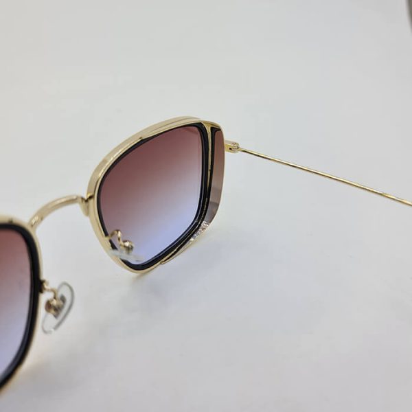 عکس از عینک آفتابی با فریم طلایی رنگ فلزی و لنز قهوه ای سایه روشن برند دیتیای ditiai مدل 9537