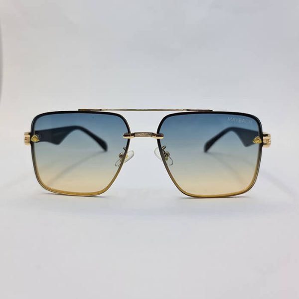 عکس از عینک آفتابی با فریم طلایی رنگ، دسته مشکی و عدسی دو رنگ maybach مدل 22036
