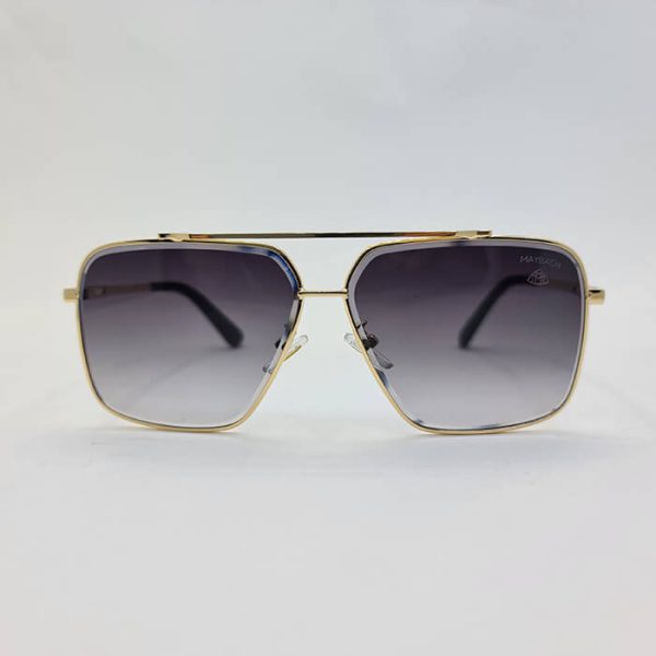 عکس از عینک دودی میباخ با فریم طلایی و مربعی شکل و عدسی سایه روشن مدل n2001