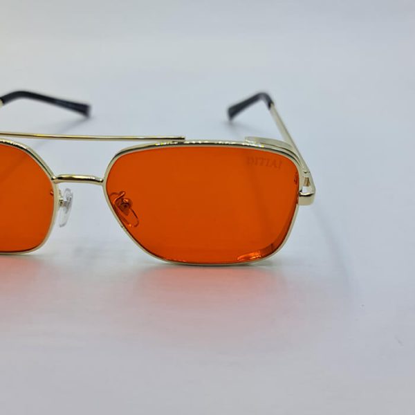 عکس از عینک دید در شب دیتیای با فریم طلایی و عدسی قرمز رنگ مدل 9550