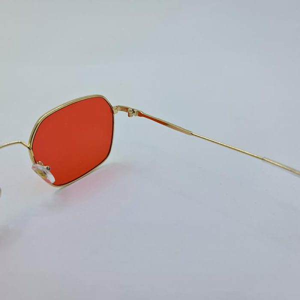 عکس از عینک شب با فریم طلایی و فلزی و عدسی قرمز برند شنل chanel مدل 22011