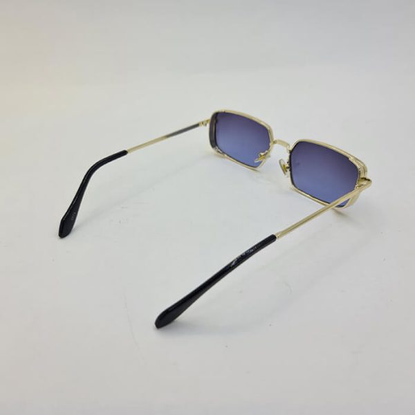 عکس از عینک آفتابی دیور dior با فریم مستطیلی و طلایی رنگ با عدسی دودی مدل 9574