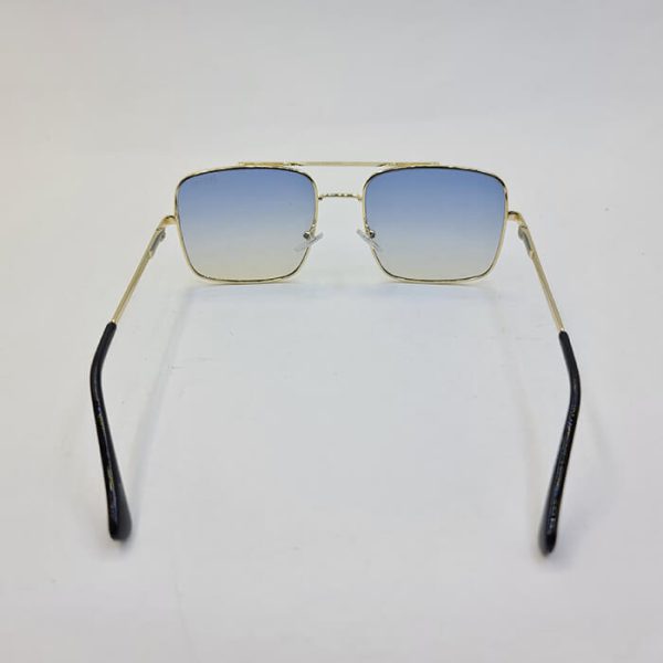 عکس از عینک شب دیتیای با فریم مربعی و طلایی رنگ و عدسی آبی مدل 1003