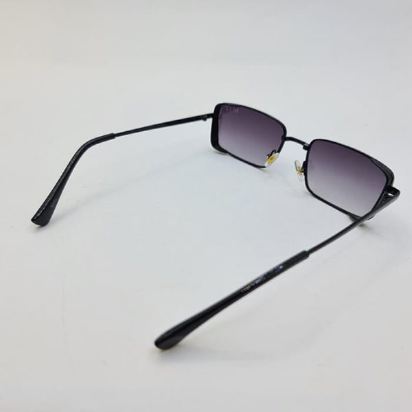 عکس از عینک آفتابی برند dita با فریم مشکی و مستطیلی شکل و عدسی دودی مدل 9575
