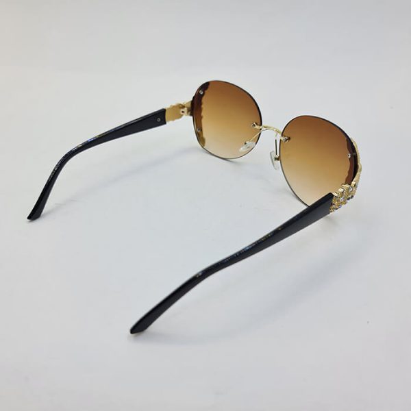 Round frame less and brown lens sunglasses for women model 124 br 6