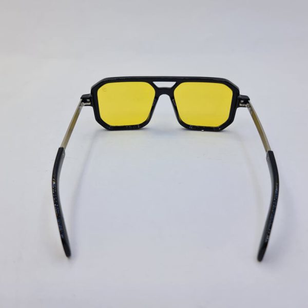 عکس از عینک شب دیوید بکهام با فریم مشکی رنگ و عدسی زرد مدل d22845