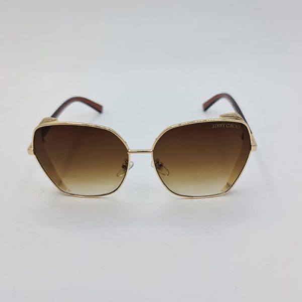 عکس از عینک آفتابی شاین دار با فریم طلایی و عدسی قهوه ای رنگ مدل 28011
