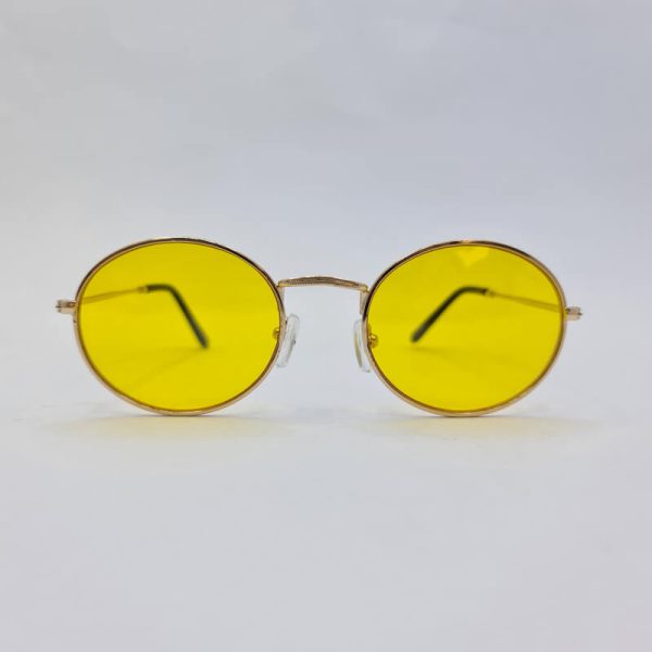 عکس از عینک شب بیضی شکل با فریم طلایی و عدسی زرد دیتیای مدل 3612