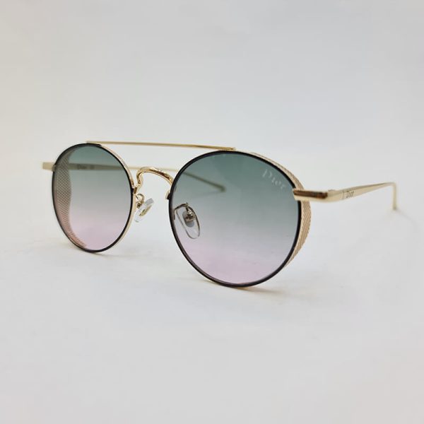 عکس از عینک آفتابی dior با عدسی سبز و فریم گرد و طلایی رنگ مدل 5012