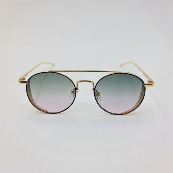 عکس از عینک آفتابی dior با عدسی سبز و فریم گرد و طلایی رنگ مدل 5012