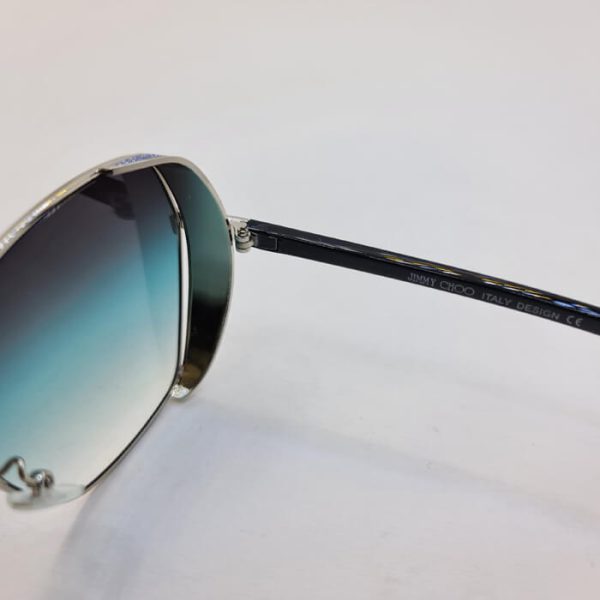 عکس از عینک آفتابی شاین دار با فریم نقره ای و عدسی رنگ سبز کله غازی مدل 28011
