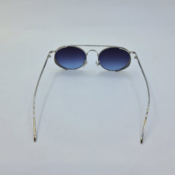 عکس از عینک آفتابی دیور با فریم گرد و نقره ای رنگ و عدسی آبی مدل 5012