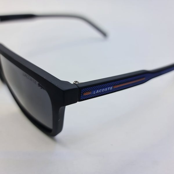 عکس از عینک آفتابی پلاریزه لاگوست با فریم مشکی مات و دسته آبی مدل 2173