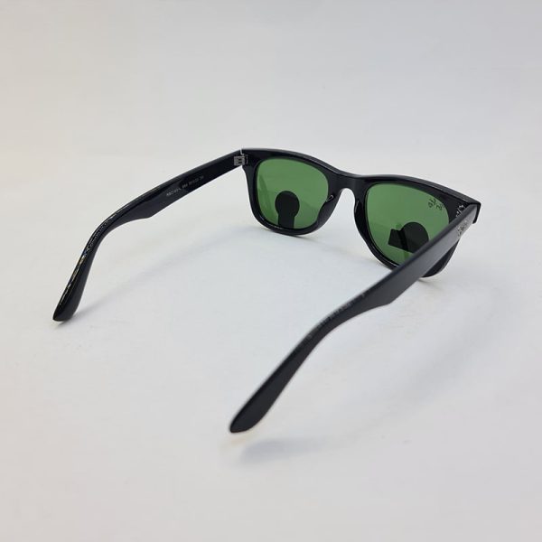 عکس از عینک آفتابی ray-ban لنز شیشه ای سبز با فریم مشکی براق مدل rb2140-884
