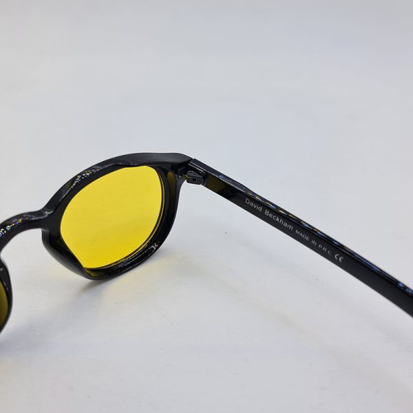 عینک دید در شب گرد دیوید بکام با فریم مشکی براق و لنز زرد مدل d22839