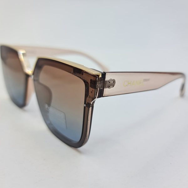 عکس از عینک آفتابی پلاریزه شنل با فریم و دسته شفاف و قهوه ای رنگ مدل p6809