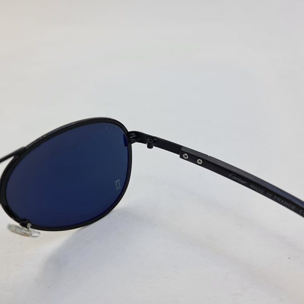 عکس از عینک آفتابی آنتی رفلکس با فریم و دسته مشکی برند کارتیه مدل 125-c6