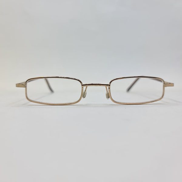 عکس از عینک مطالعه با نمره چشم 2. 75 و طرح خودکاری و قاب زرد
