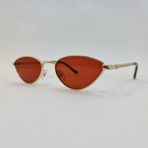عکس از عینک شب شنل با فریم مثلثی و لنز قرمز و دسته زنجیری مدل G29546