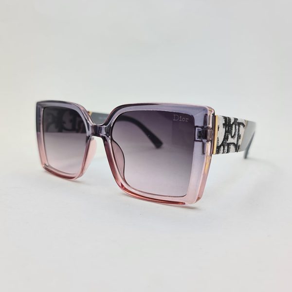 عکس از عینک آفتابی دیور با فریم صورتی و بنفش و دسته طوسی مدل 6818
