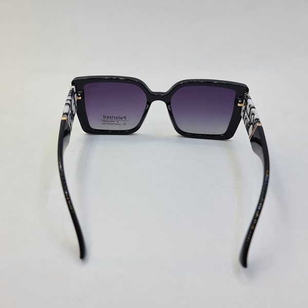 عکس از عینک آفتابی پلاریزه dior با دسته طرح دار و فریم مشکی رنگ مدل p6818