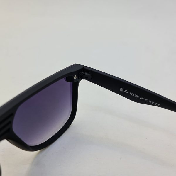 عکس از عینک آفتابی ریبن با عدسی یکسره و اسپرت و 4 پل بینی و فریم مشکی مدل 4687
