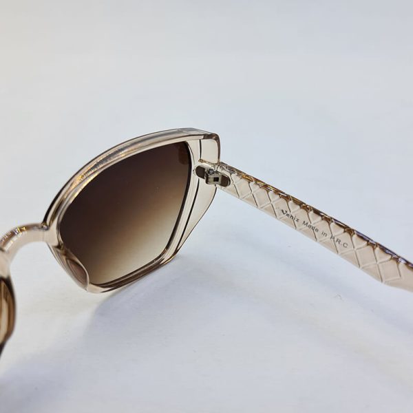 عکس از عینک آفتابی بچگانه با فریم قهوه ای شیشه ای با لنز سایه روشن مدل 3083