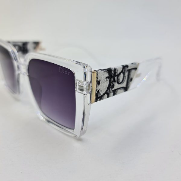عکس از عینک آفتابی دیور با دسته طرح دار و فریم بی رنگ و شفاف مدل 6818