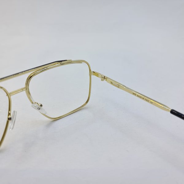 عکس از عینک دید در شب دیتا با فریم طلایی و فلزی و لنز بی رنگ و شفاف مدل d2001
