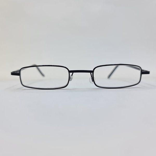 عکس از عینک مطالعه با نمره چشم 3. 00 و طرح خودکاری و قاب مشکی و زرد