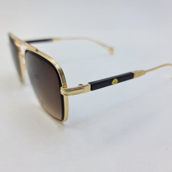 عکس از عینک آفتابی میباخ با فریم طلایی رنگ و عدسی قهوه ای سایه روشن مدل m011