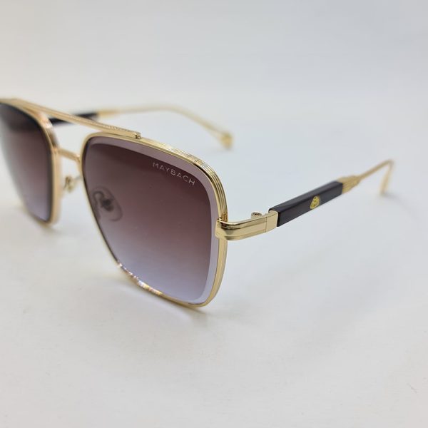 عکس از عینک آفتابی میباخ با فریم طلایی رنگ و عدسی قهوه ای بلوطی مدل m011