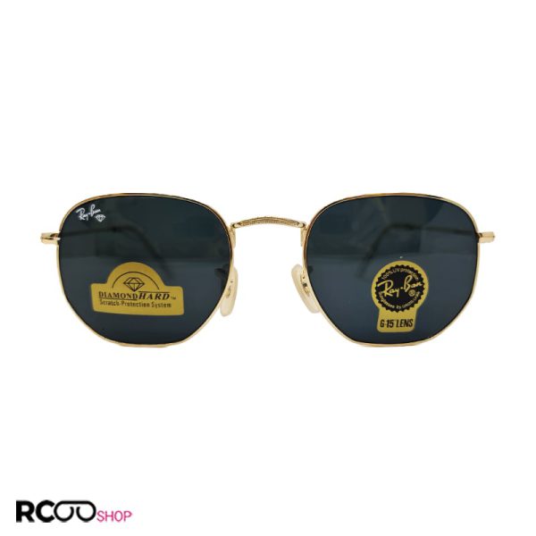 عکس از عینک آفتابی ریبن با فریم طلایی و لنز سنگ چندضلعی مدل 3548