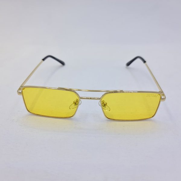 عکس از عینک دید در شب با فریم مستطیلی شکل و لنز زرد رنگ برند دیتیای مدل 9549