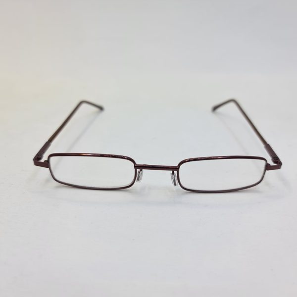 عکس از عینک مطالعه با نمره چشم 3. 00 و طرح خودکاری و قاب قهوه ای و زرد