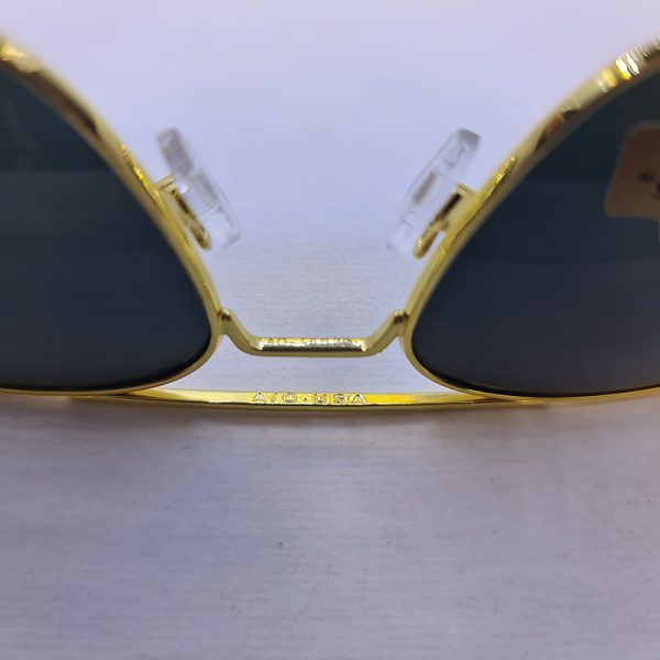 عکس از عینک دودی امریکن اپتیکال با عدسی سنگ و آنتی رفلکس و فریم طلایی رنگ مدل sky