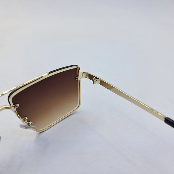 عکس از عینک آفتابی دیتیای با فریم طلایی رنگ و فلزی و لنز قهوه ای مدل 9683