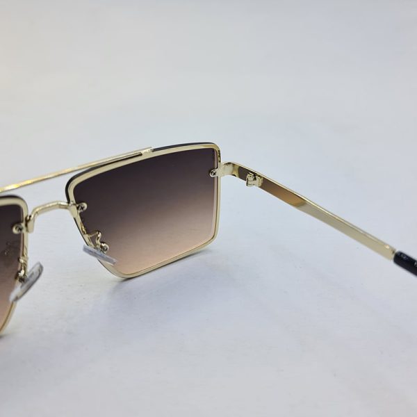 عکس از عینک آفتابی دیتیای با فریم طلایی رنگ و عدسی قهوه ای تیره مدل 9683