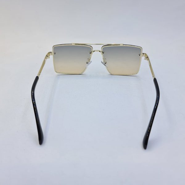 عکس از عینک آفتابی دیتیای با فریم طلایی و عدسی دو رنگ دودی و قهوه ای مدل 9683