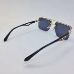 عکس از عینک آفتابی میباخ با فریم طلایی، دسته مشکی و عدسی دودی مدل GZ1290